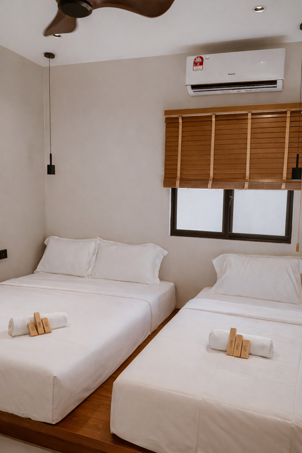 A queen bed and a single bed.